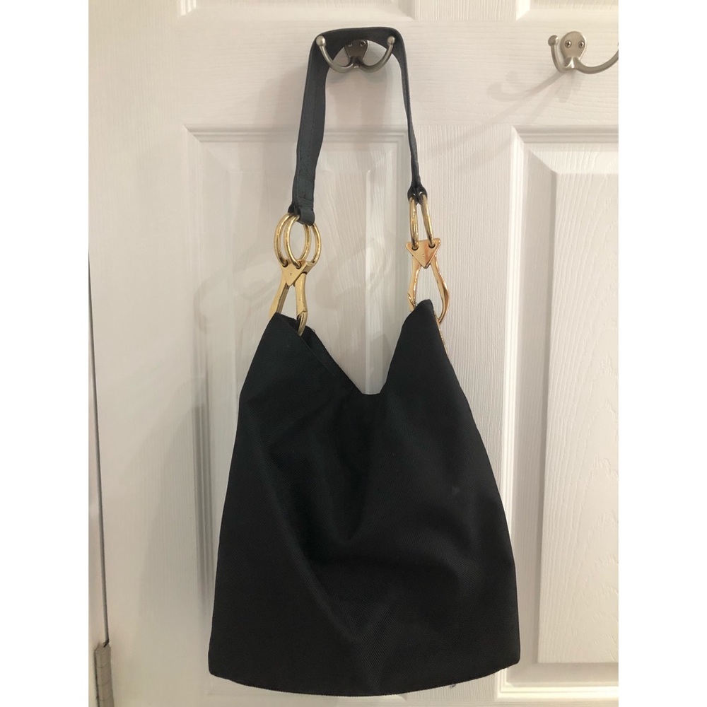 Black handbag with gold hardware